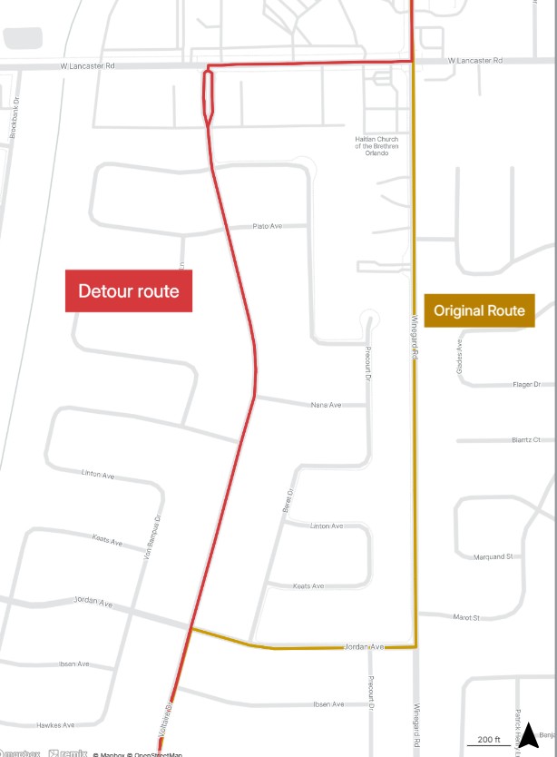 Map showing a detour route in red diverting west from the original yellow route along a north-south road.
